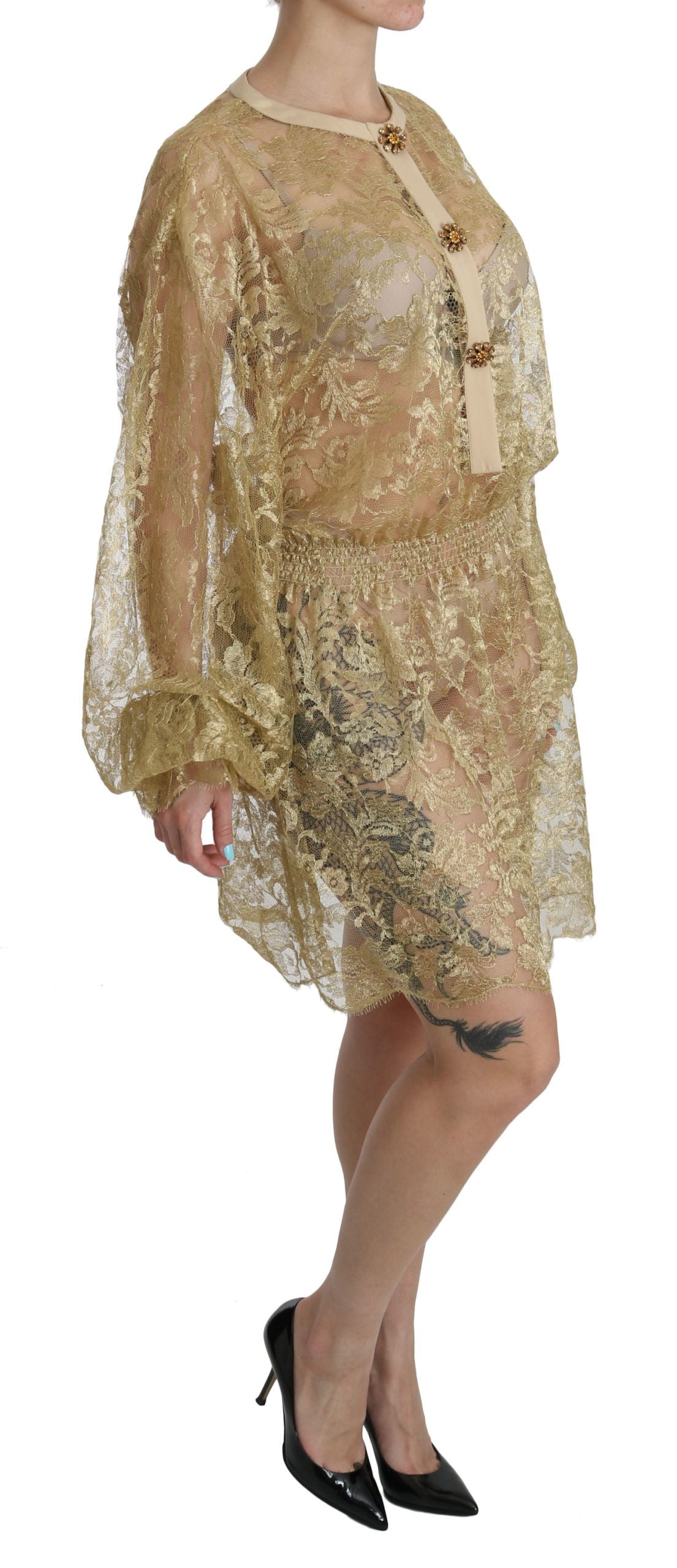 Robe trapèze transparente en dentelle dorée Dolce & Gabbana, longueur genou