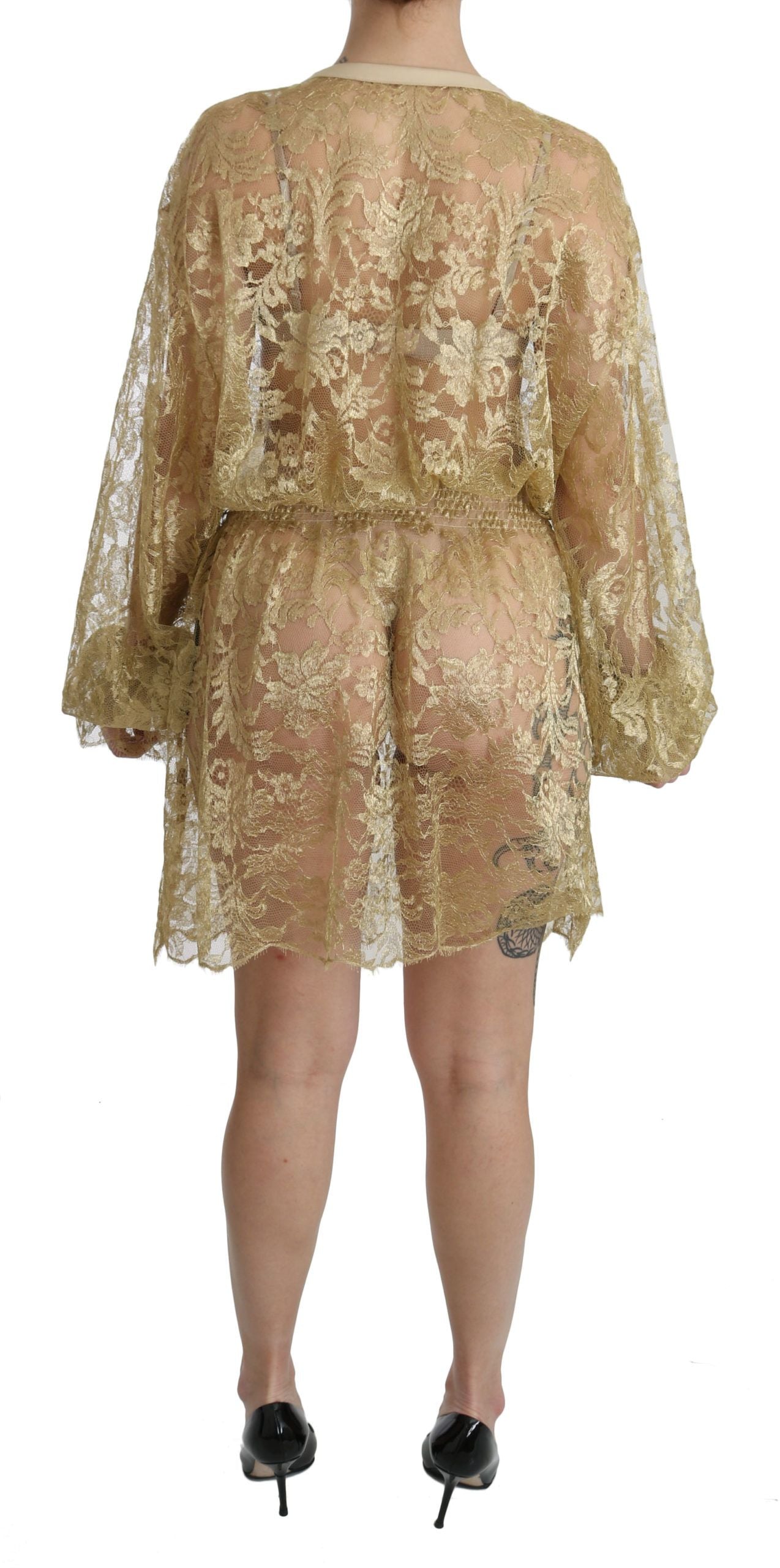 Robe trapèze transparente en dentelle dorée Dolce & Gabbana, longueur genou