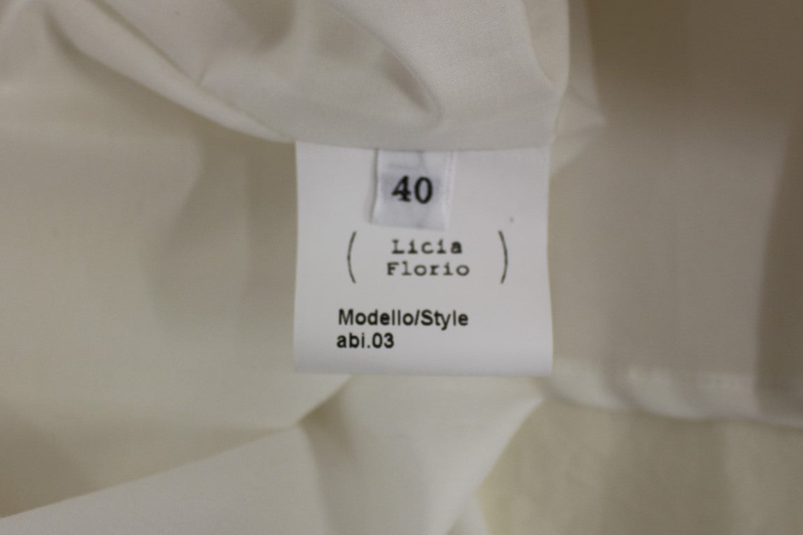 Robe blanche dos nu longueur genou Licia Florio