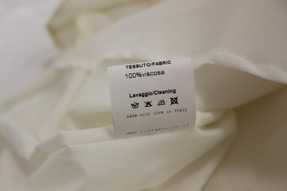 Robe blanche dos nu longueur genou Licia Florio
