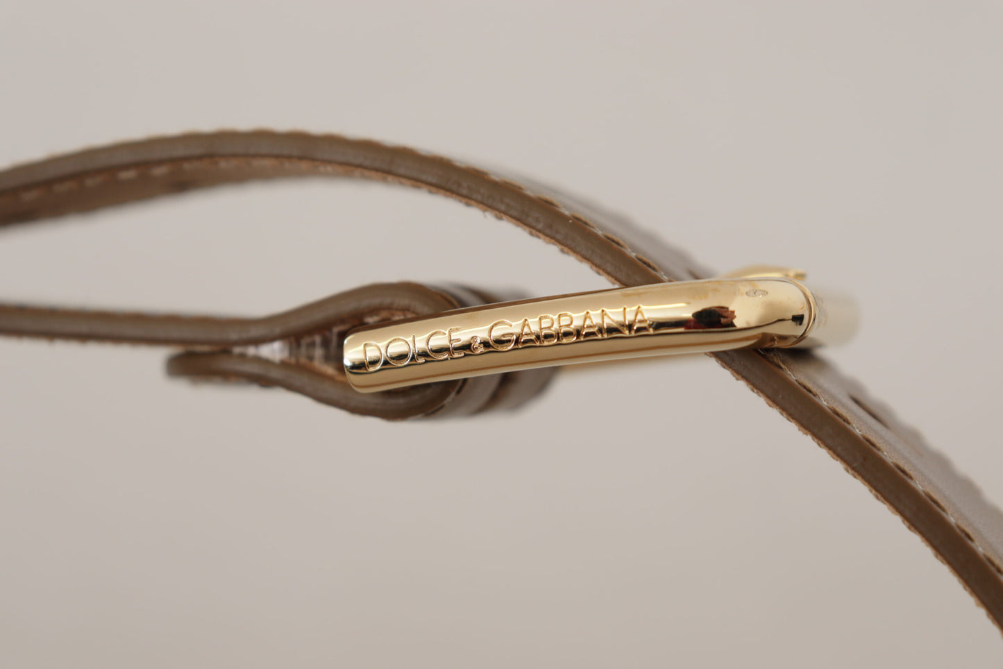 Ceinture Dolce & Gabbana en cuir bronze avec logo doré gravé