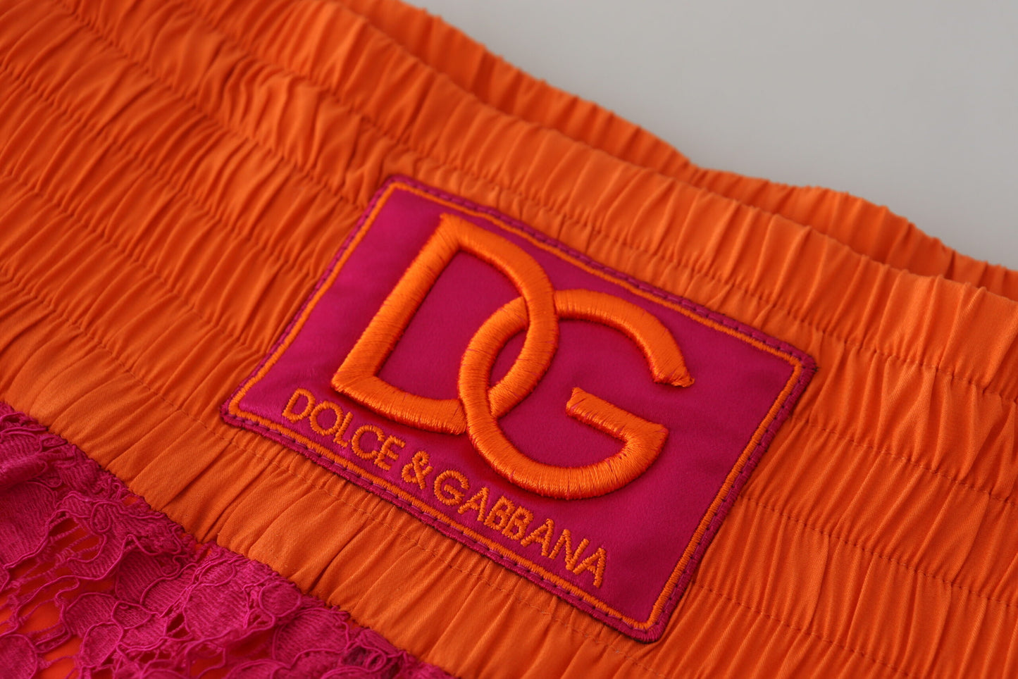 Dolce & Gabbana Pink-orangefarbene Shorts aus Baumwolle mit hoher Taille