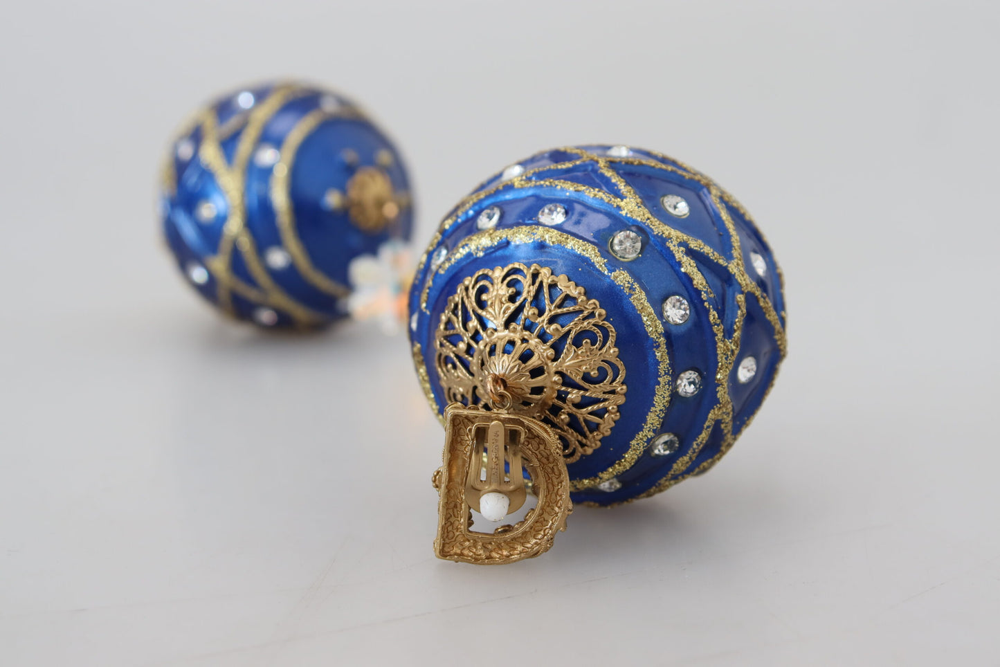 Boucles d'oreilles à clip Dolce & Gabbana en laiton doré et cristal bleu