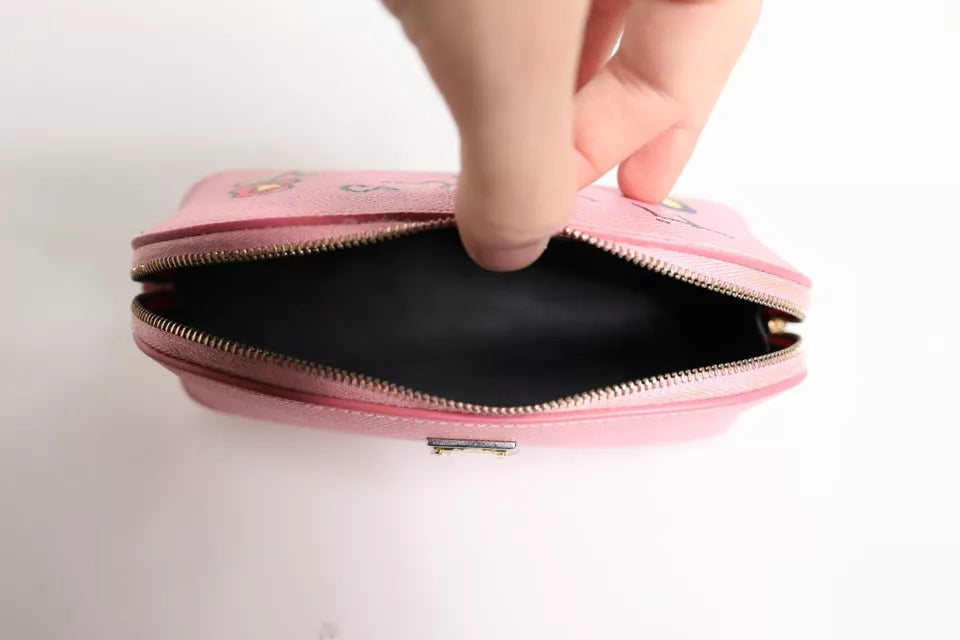 Portefeuille à fermeture éclair Dolce & Gabbana en cuir rose avec logo DG