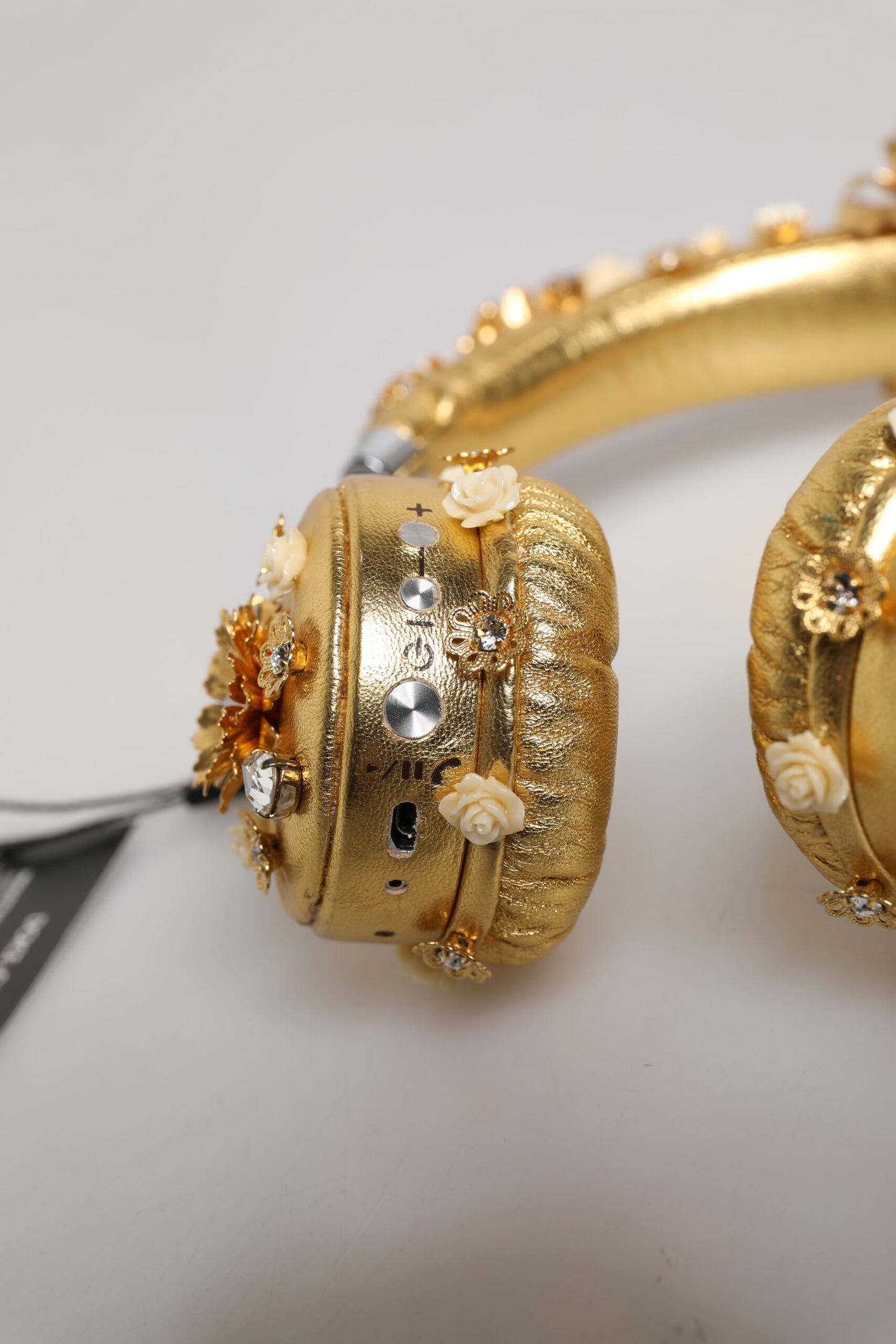 Casque audio Dolce & Gabbana en cuir doré avec motif floral et cristaux Angel