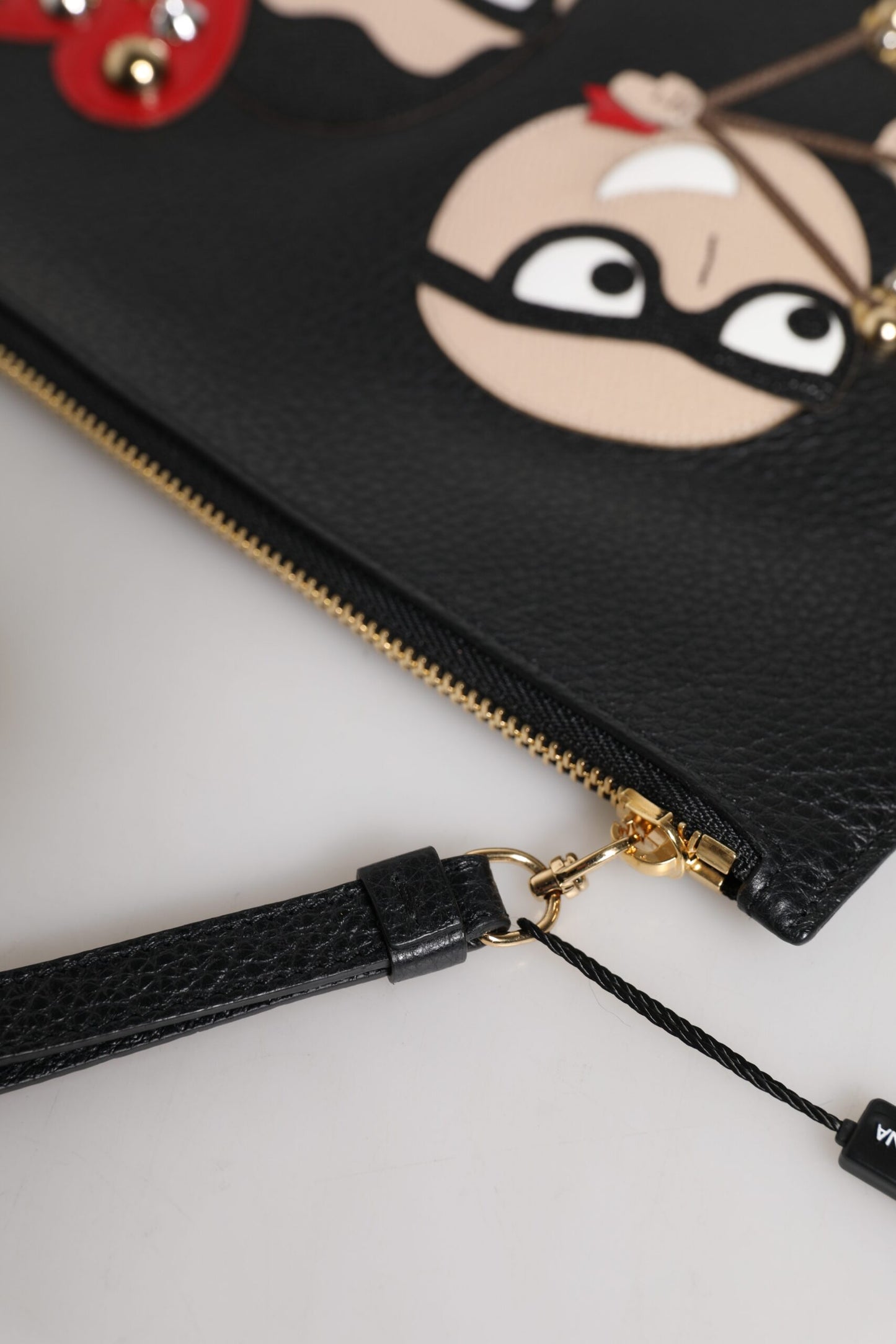 Pochette en cuir noir à ornements Dolce & Gabbana #DGFamily