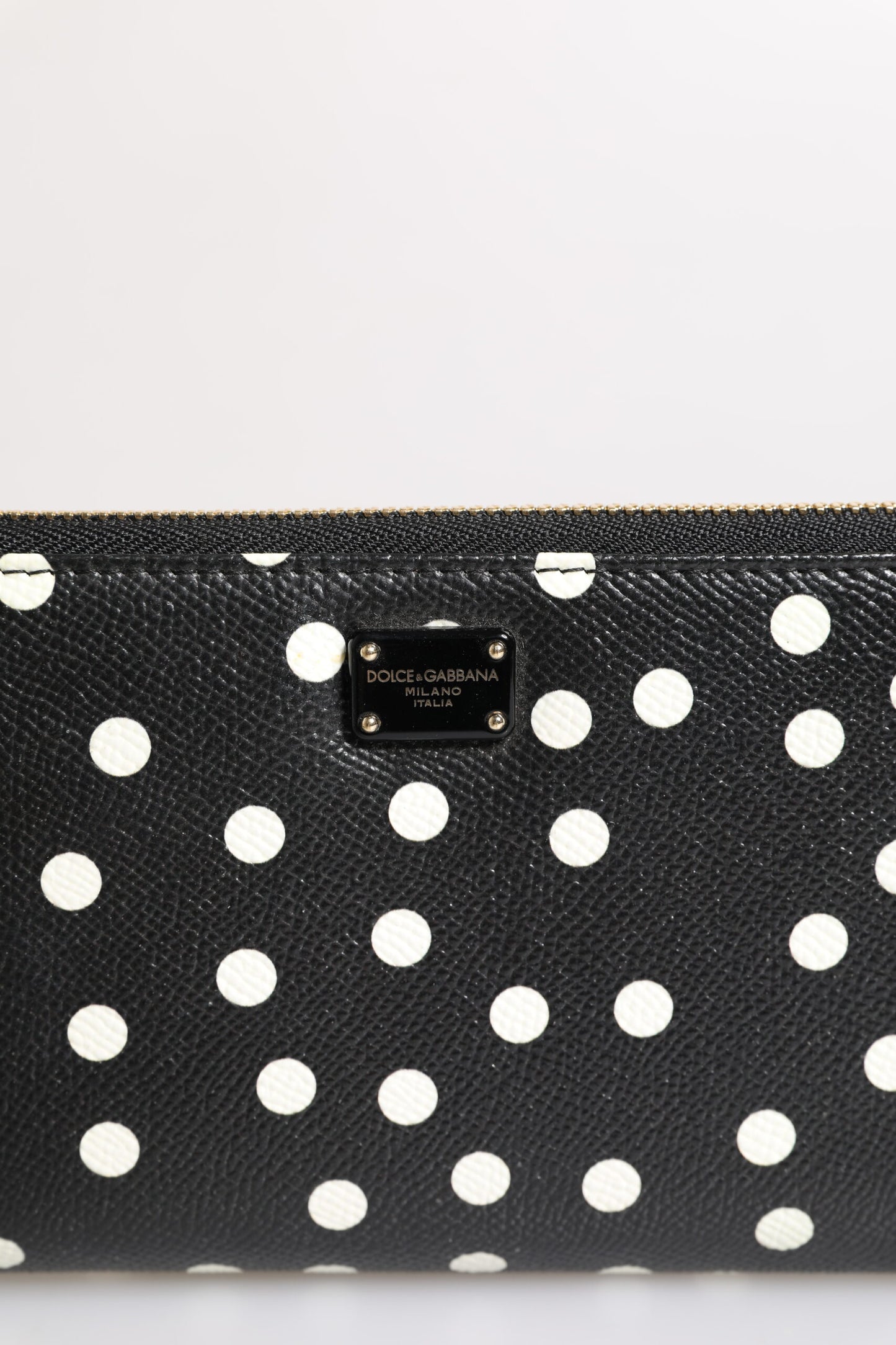 Portefeuille continental zippé Dolce & Gabbana en cuir noir et blanc à pois