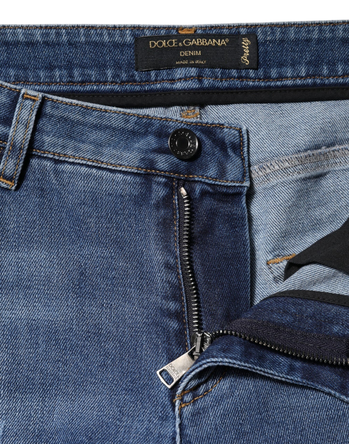 Jean taille basse en denim bleu déchiré Dolce & Gabbana