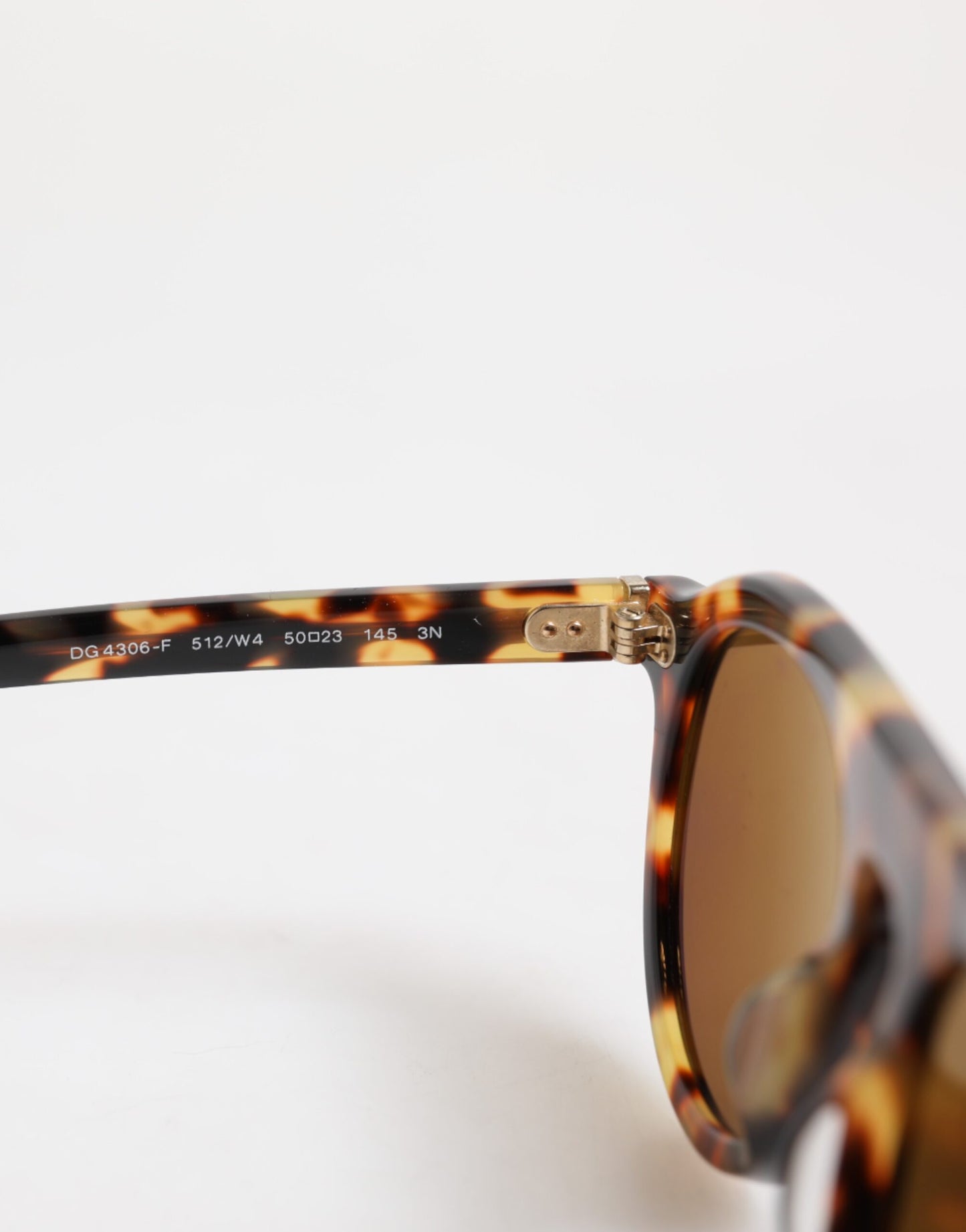 Lunettes de soleil rondes en acétate marron à imprimé léopard Dolce & Gabbana