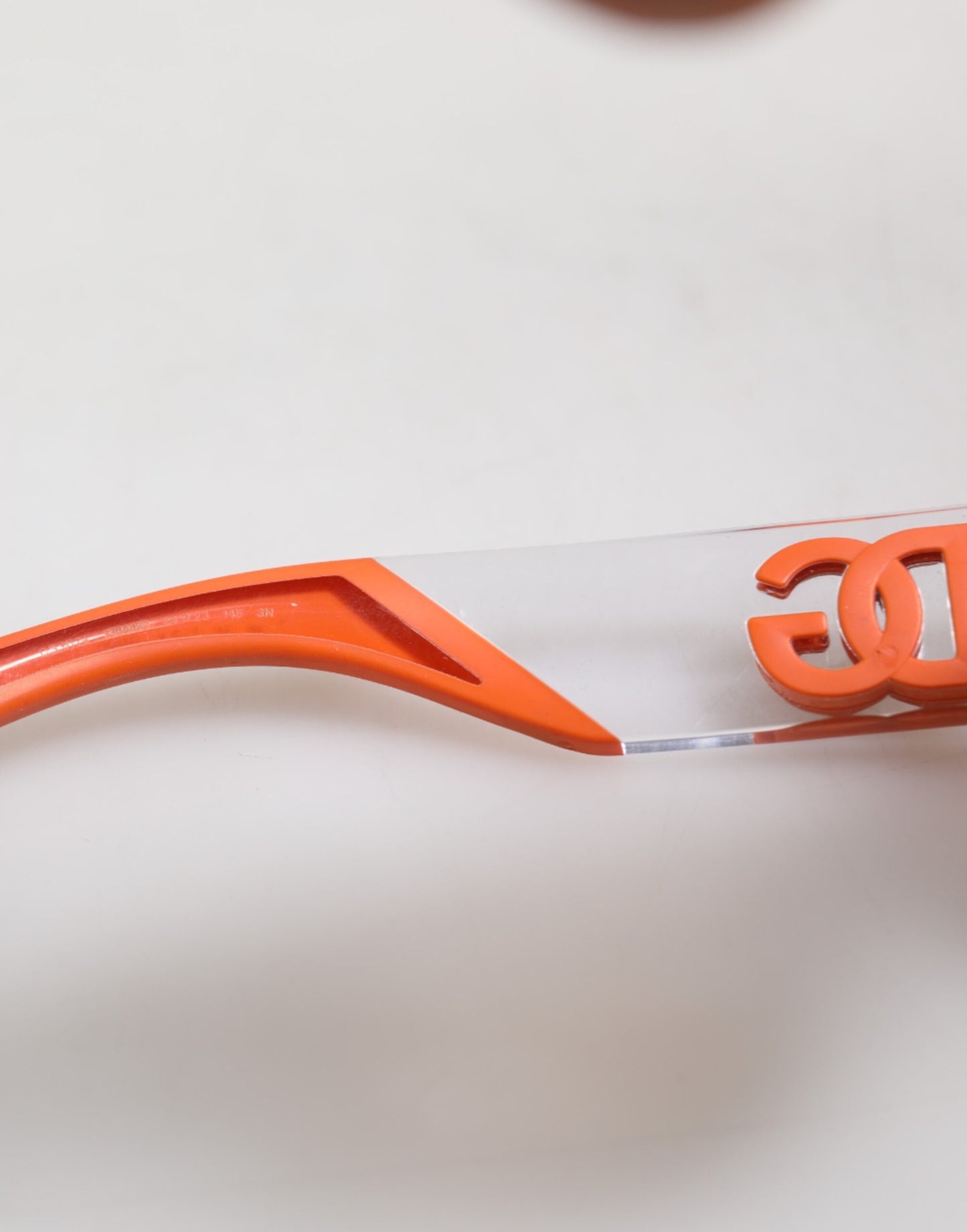 Lunettes de soleil à monture ovale orange Reborn To Live de Dolce & Gabbana avec logo