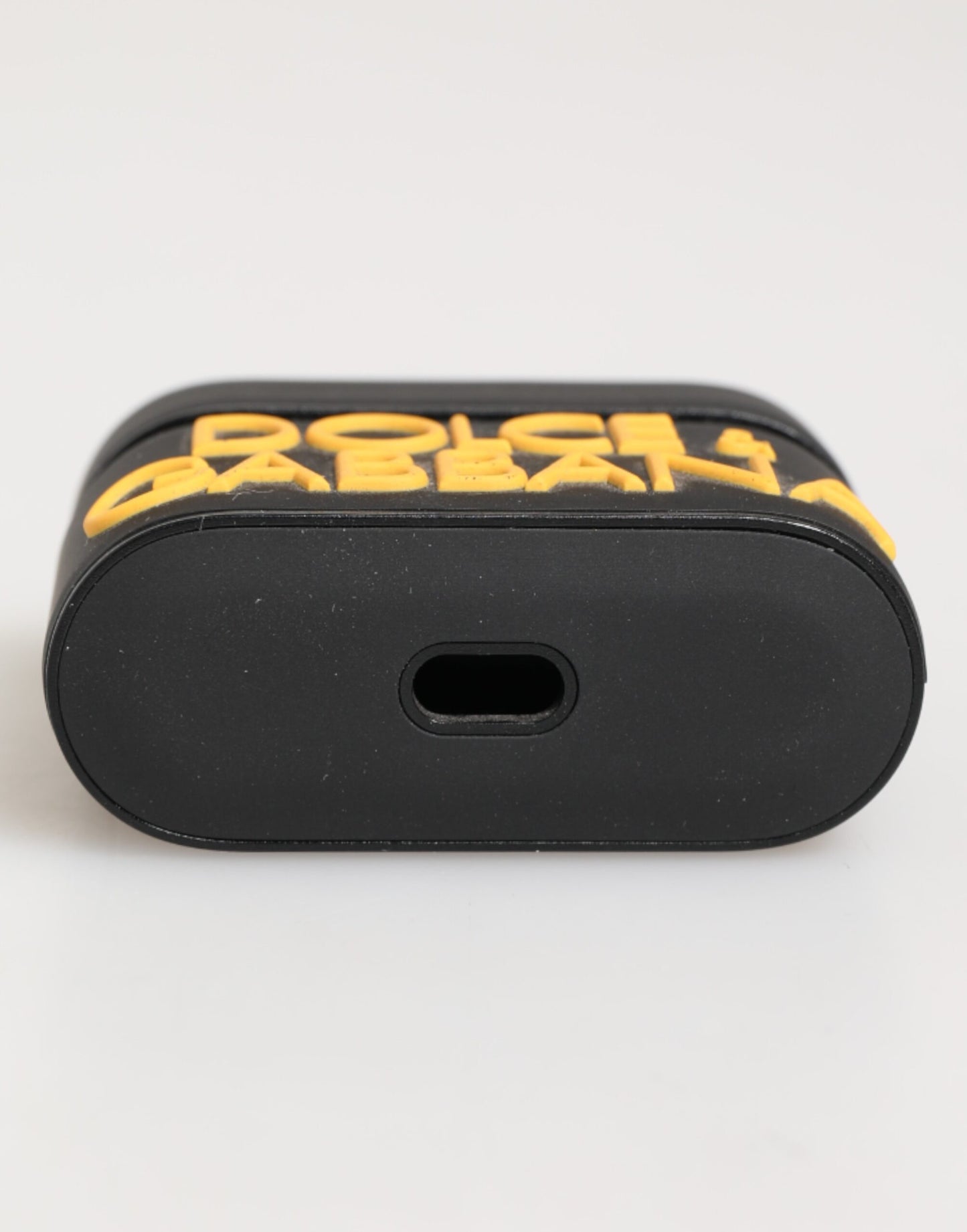 Dolce & Gabbana – Airpods-Etui mit geprägtem Logo aus Gummi in Schwarz und Gelb