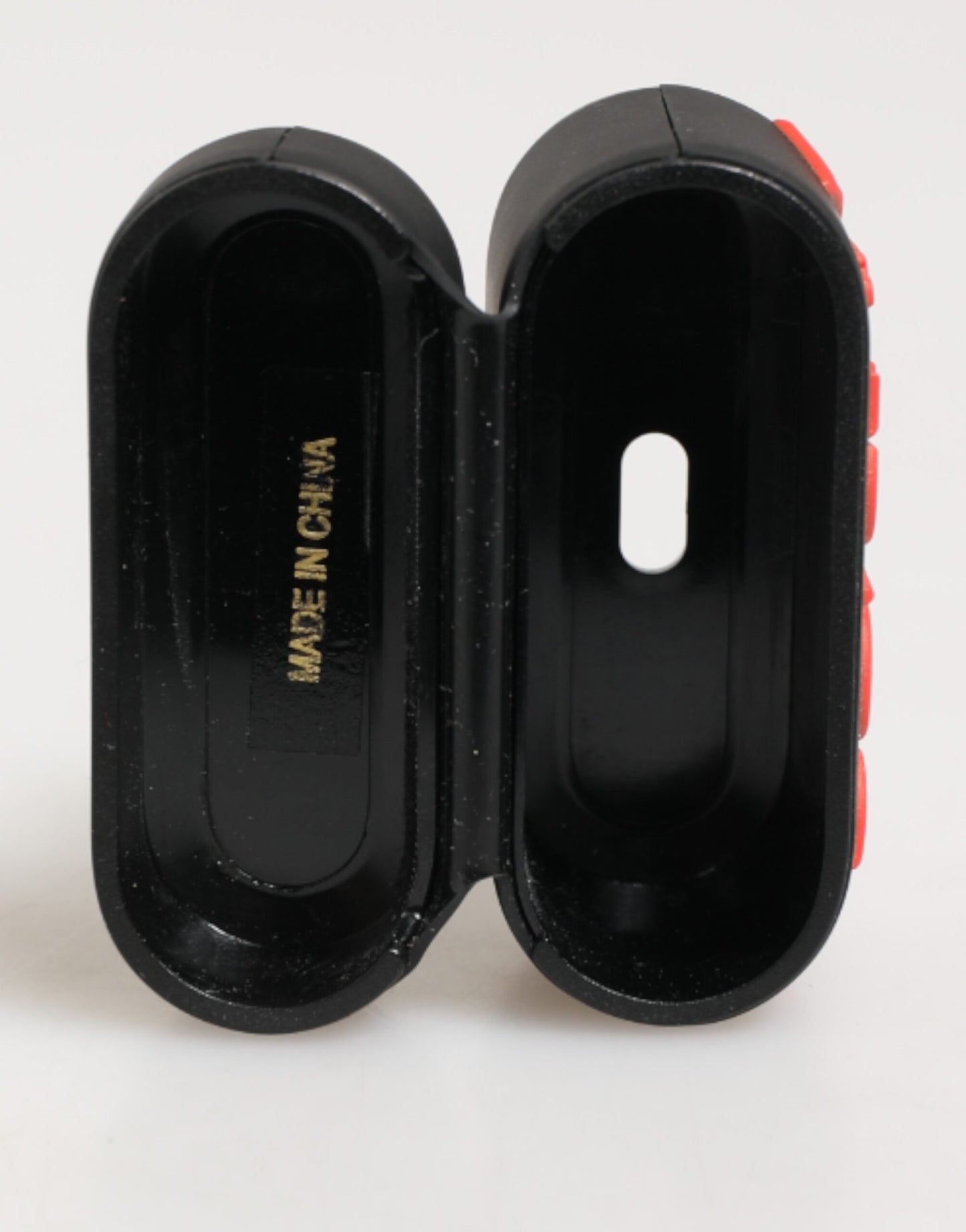Étui pour Airpods Dolce & Gabbana en caoutchouc noir et orange avec logo en relief