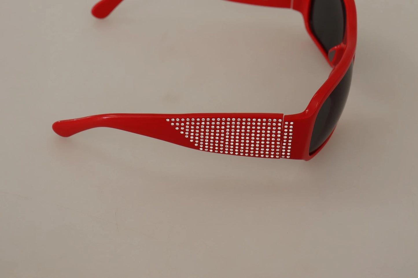 Lunettes de soleil Dolce & Gabbana DG4027 à verres noirs et cristaux rouges