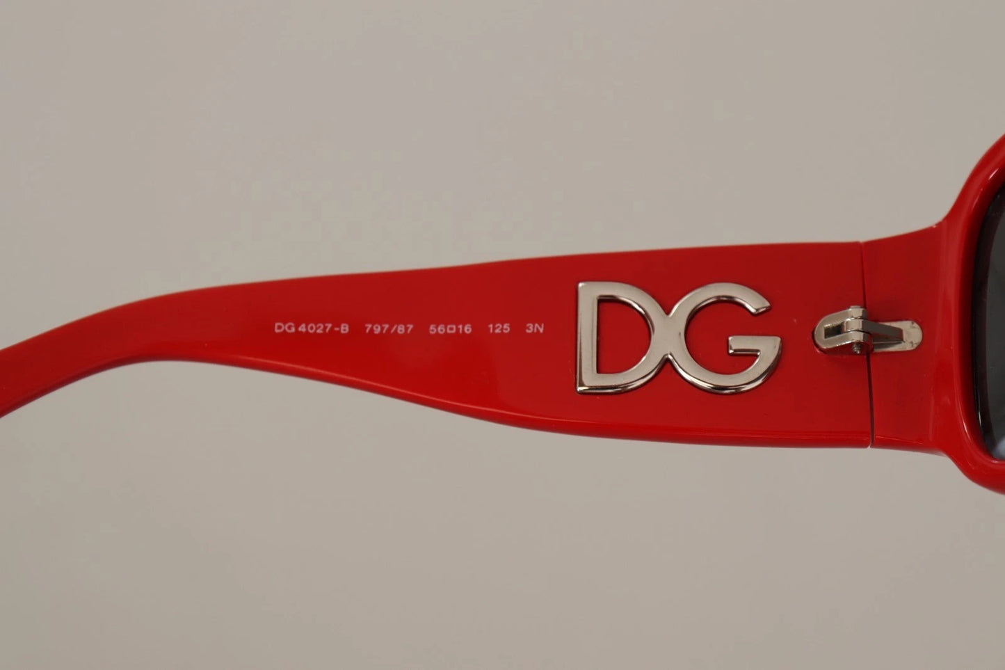 Lunettes de soleil Dolce & Gabbana DG4027 à verres noirs et cristaux rouges