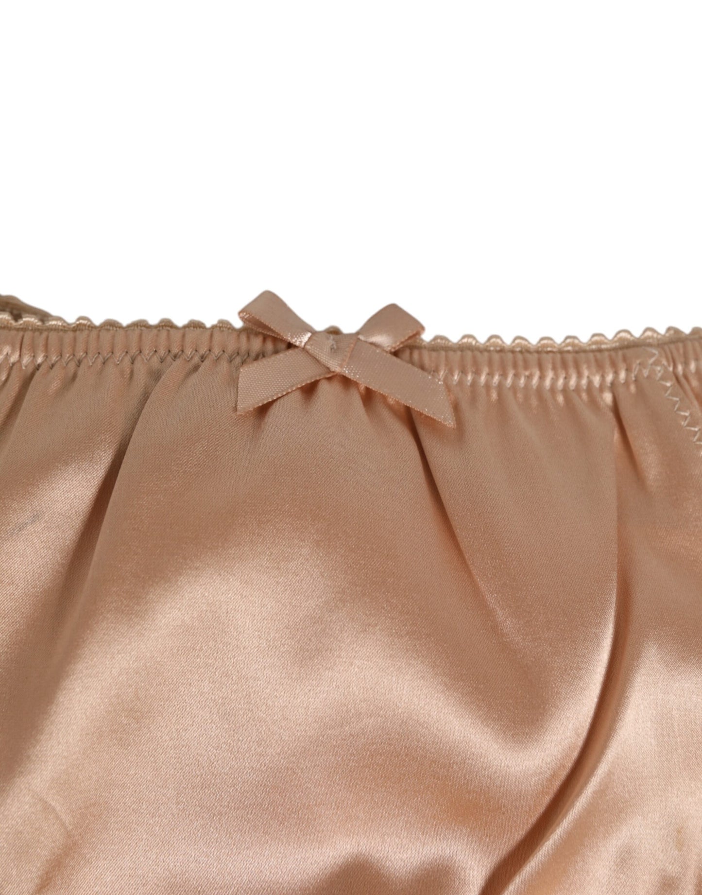 Dolce & Gabbana – Unterwäsche aus Seidensatin mit Schleife und Spitzenbesatz in Nude-Beige