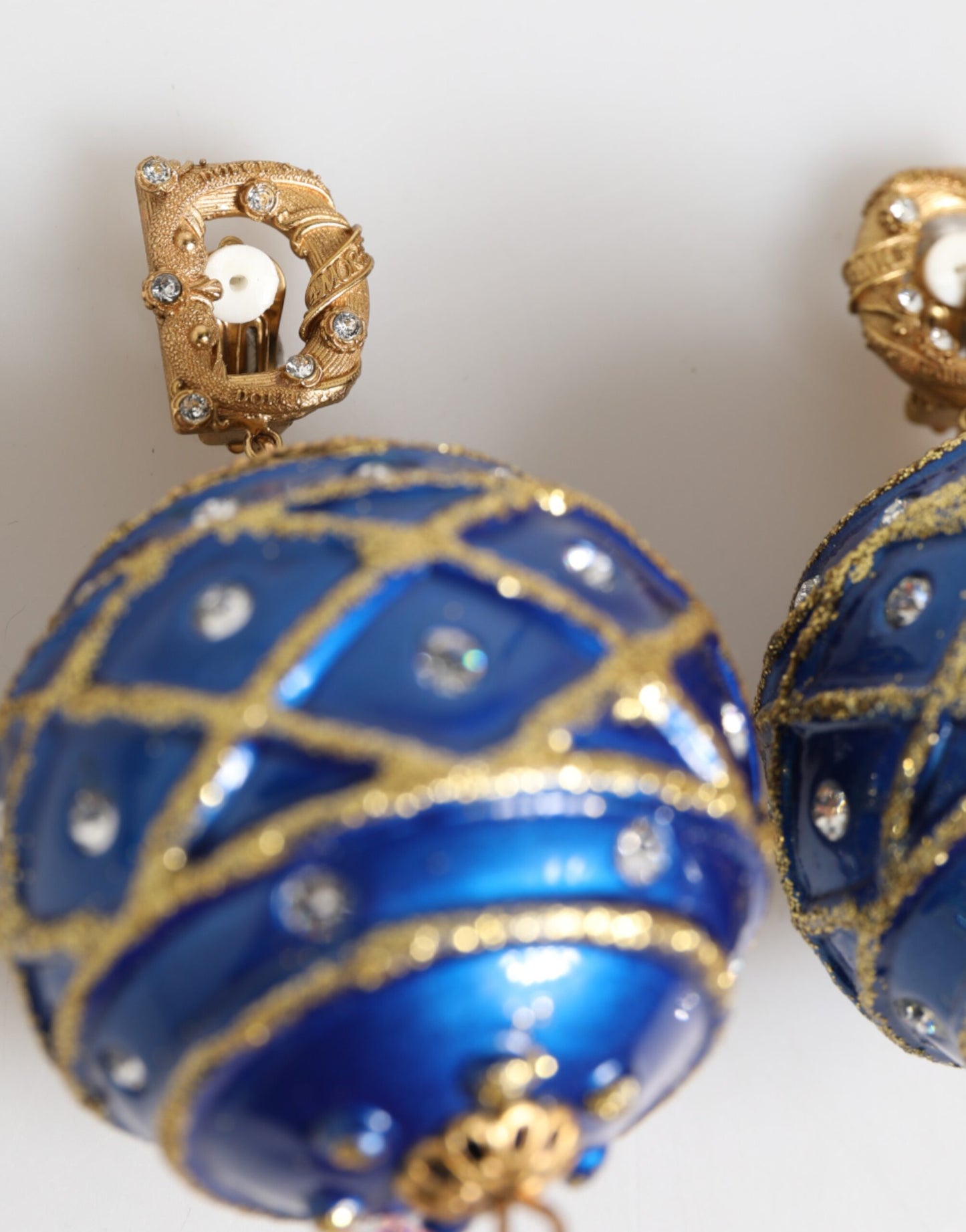 Boucles d'oreilles à clip Dolce & Gabbana en laiton doré et cristal bleu boule de Noël
