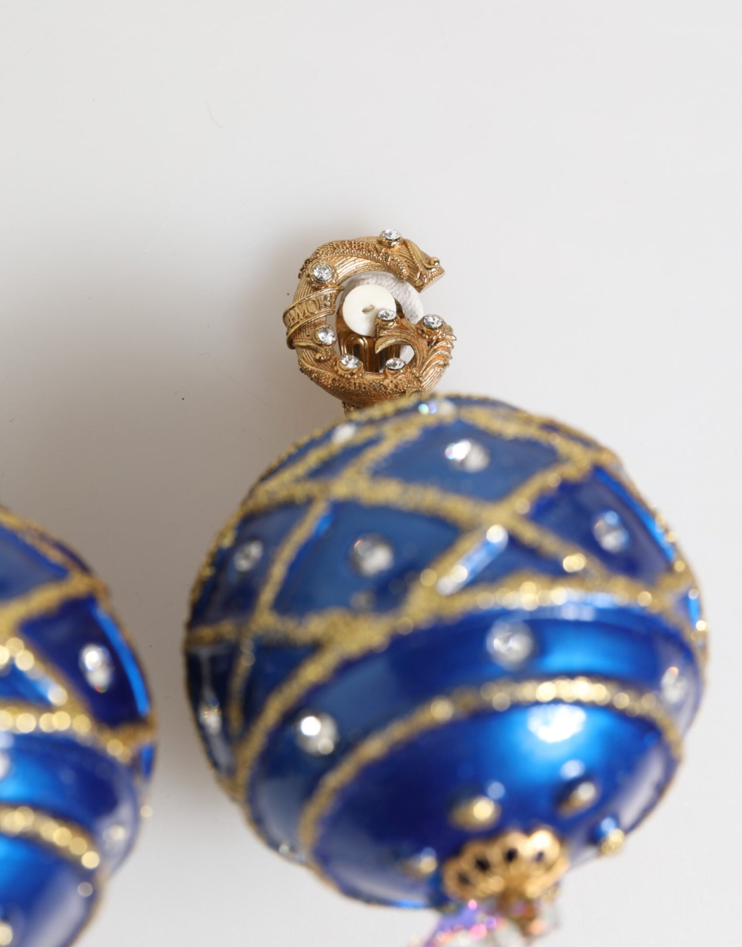 Boucles d'oreilles à clip Dolce & Gabbana en laiton doré et cristal bleu boule de Noël