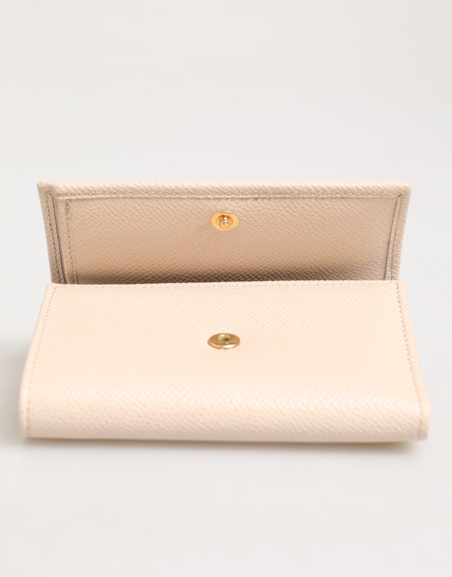 Portefeuille à rabat français Dolce & Gabbana en cuir de veau rose clair avec logo DG