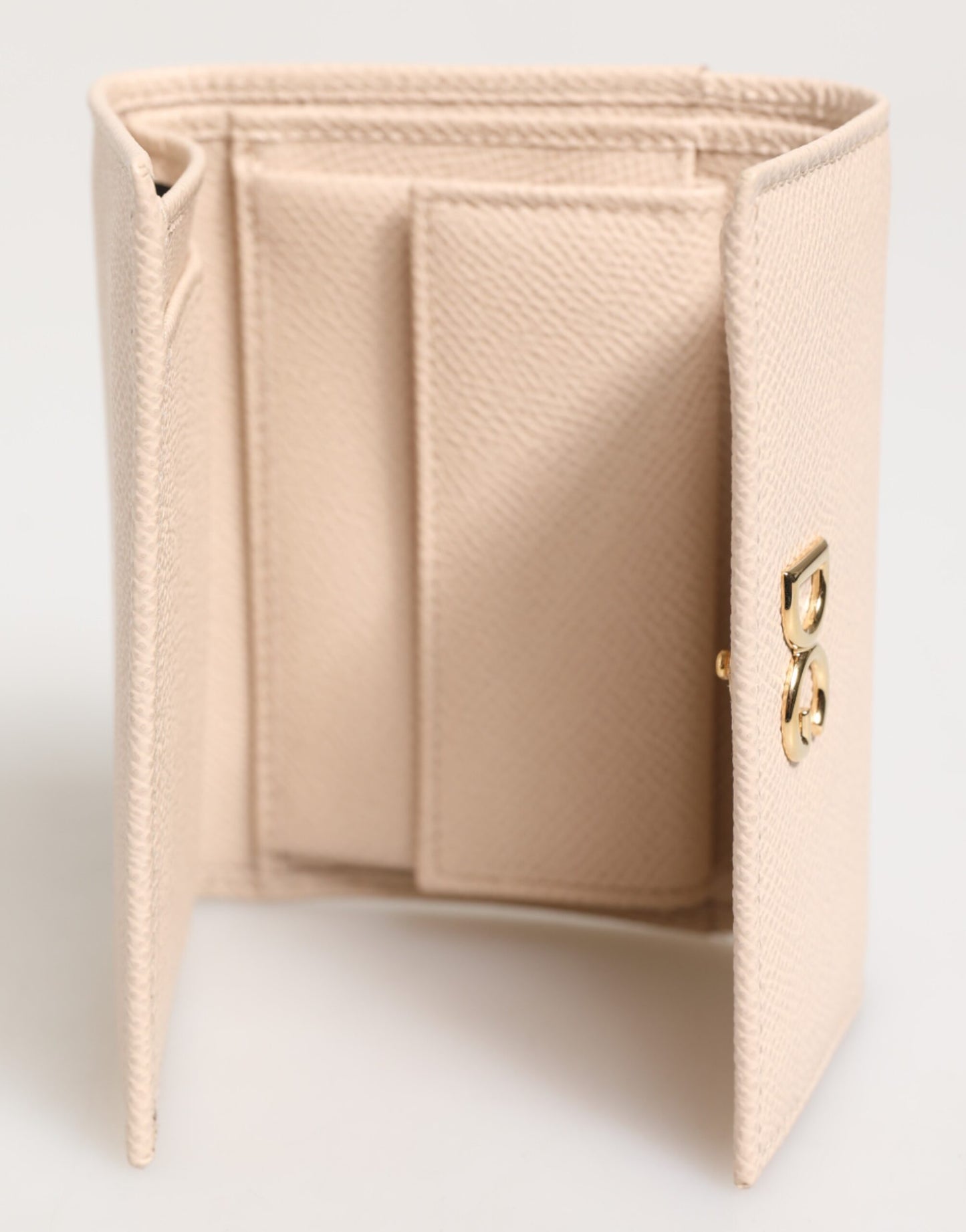 Portefeuille à rabat français Dolce & Gabbana en cuir de veau rose clair avec logo DG