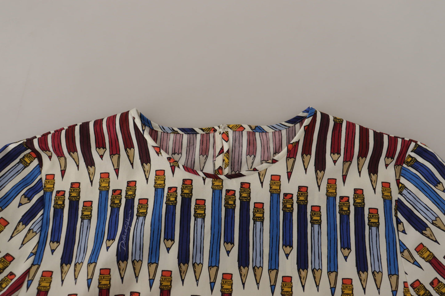 Dolce &amp; Gabbana – Weiße T-Shirt-Bluse aus Baumwolle mit Bleistiftdruck