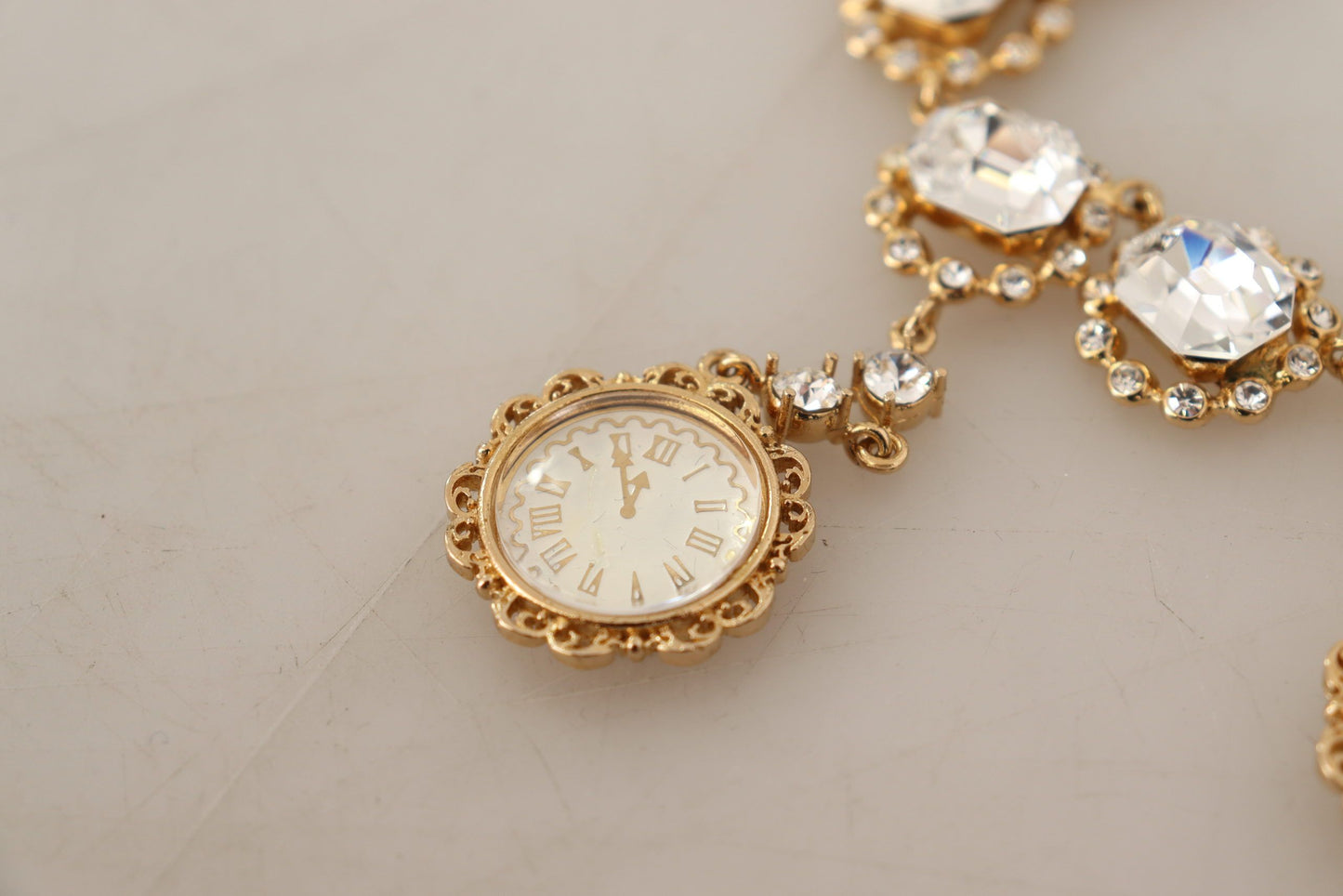 Collier Dolce &amp; Gabbana avec chaîne en cristal et horloge dorée