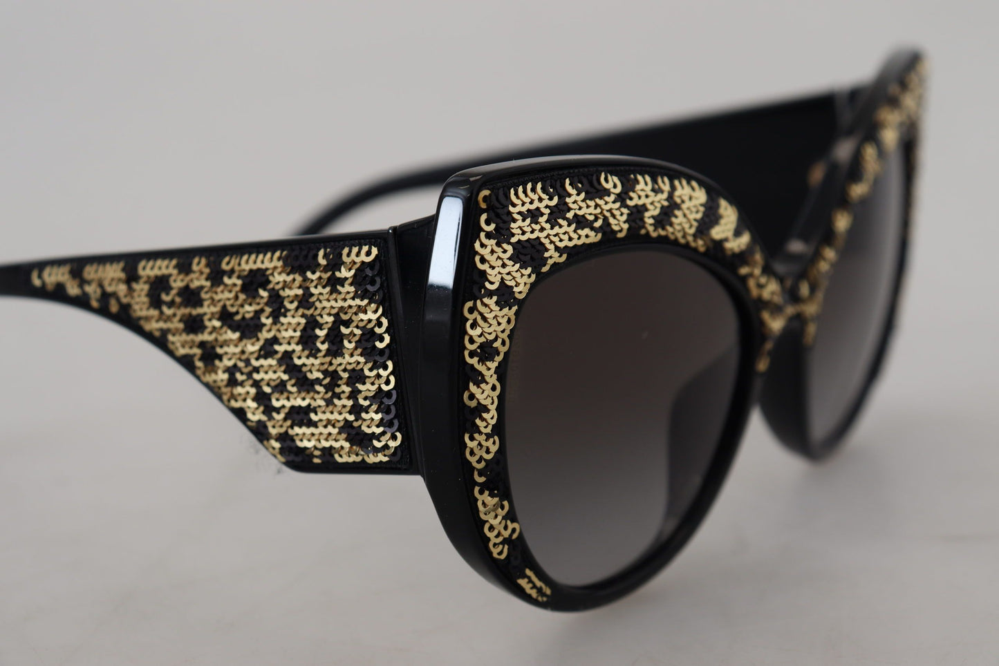 Lunettes de soleil papillon polarisées Dolce &amp; Gabbana à paillettes noires et dorées DG4326