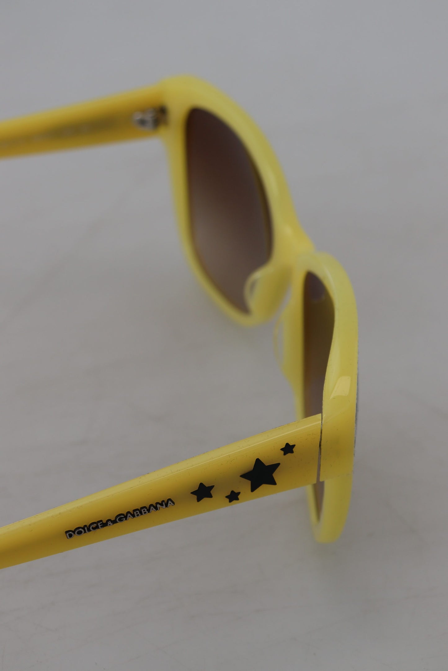 Lunettes de soleil Dolce &amp; Gabbana DG4124 à monture en acétate jaune et étoiles