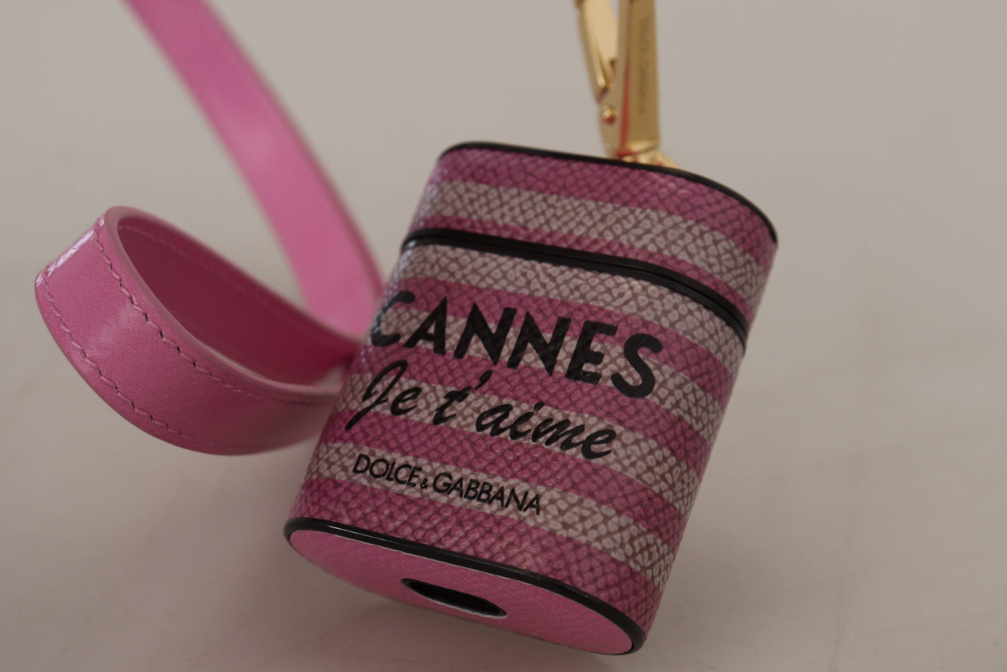 Étui pour Airpods Dolce &amp; Gabbana avec bracelet en cuir rose et noir et logo en métal doré