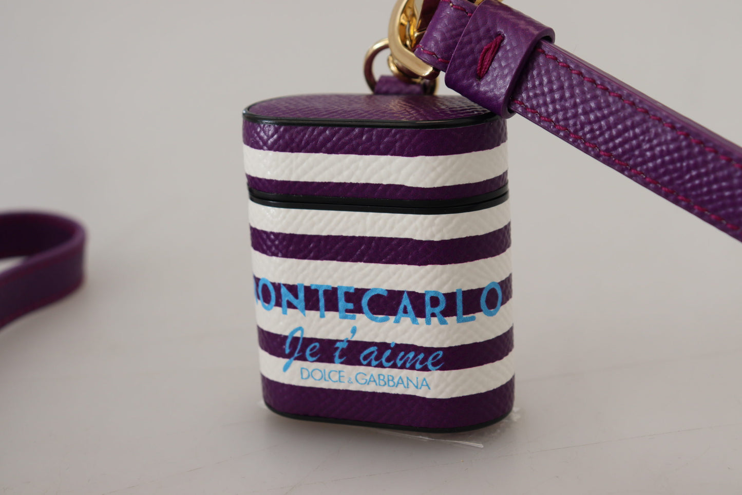 Étui pour Airpods Dolce &amp; Gabbana avec bracelet en cuir violet et logo en métal doré