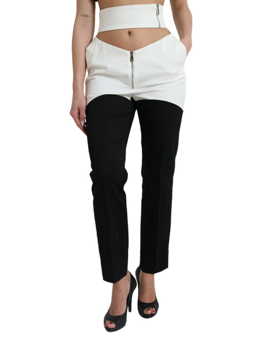 Pantalon fuselé en coton noir et blanc Dolce &amp; Gabbana avec découpes à la taille