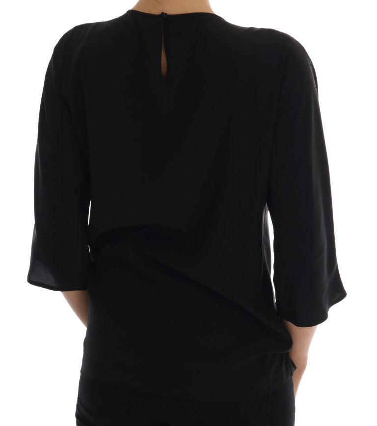 Chemisier en soie noire Dolce &amp; Gabbana avec cristaux et haut conte de fées