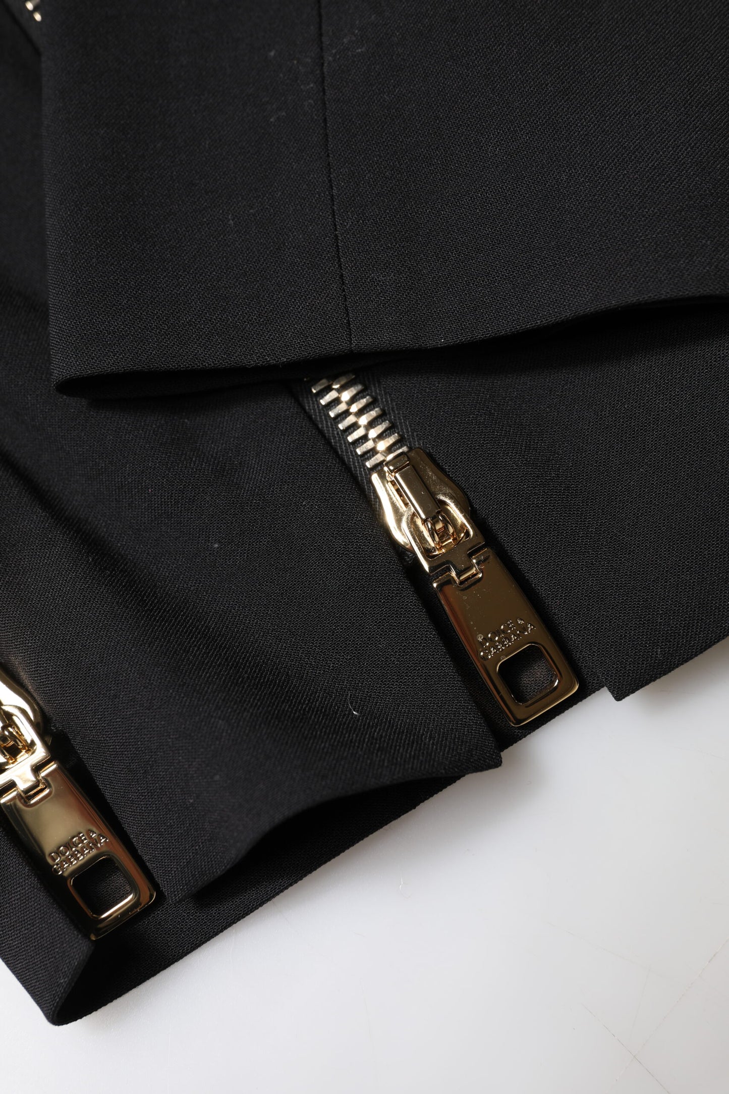 Dolce &amp; Gabbana – Schwarze, hoch taillierte Karottenhose aus Wolle mit Reißverschluss