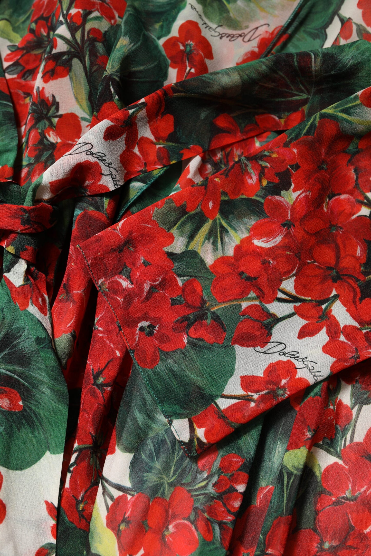 Dolce &amp; Gabbana – Mehrfarbiges, geblümtes Kleid mit langen Ärmeln und V-Ausschnitt