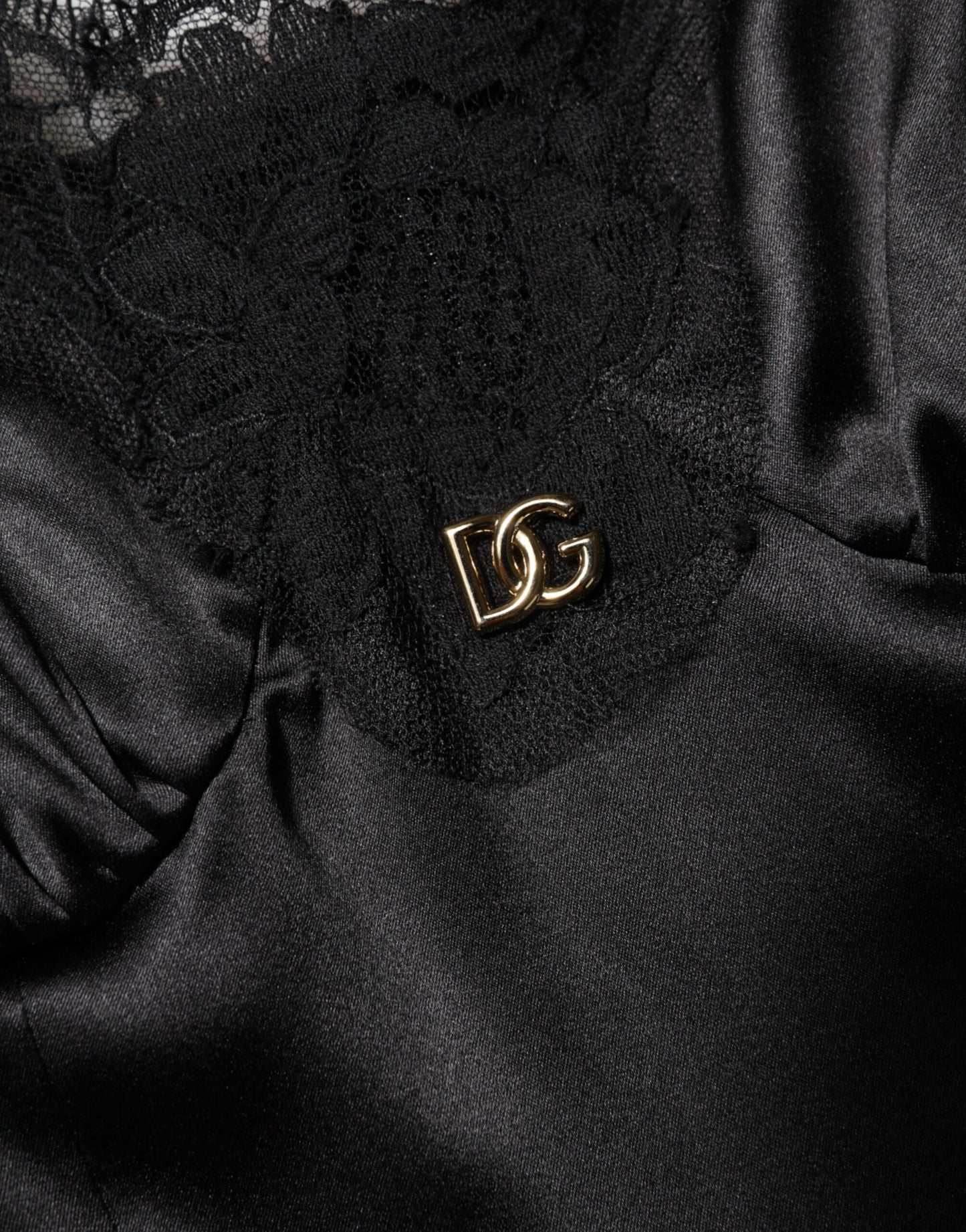 Mini-robe sans manches en soie mélangée noire Dolce &amp; Gabbana avec bordure en dentelle